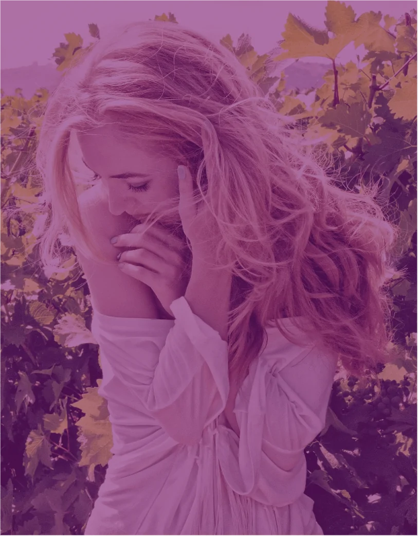 woman with long wavy hair outdoors