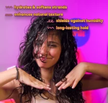 Wavy hair model showing hydration, texture enhancement, humidity protection, and long-lasting hold
