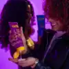 Moisturizing curl cream being applied to natural curly hair, showcasing the Curlit brand’s styling products for textured and curly hair care. Ideal for enhancing and defining curls with hydration.