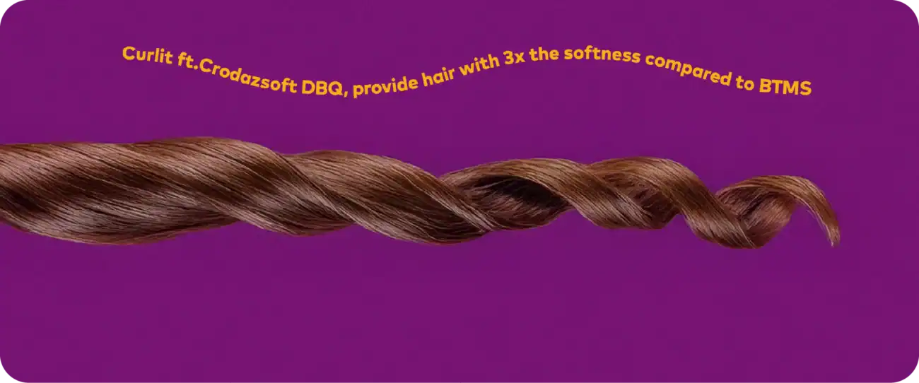 Silky curled hair sample showcasing the Curlit hair product for soft, bouncy curls with enhanced softness compared to BTMS.
